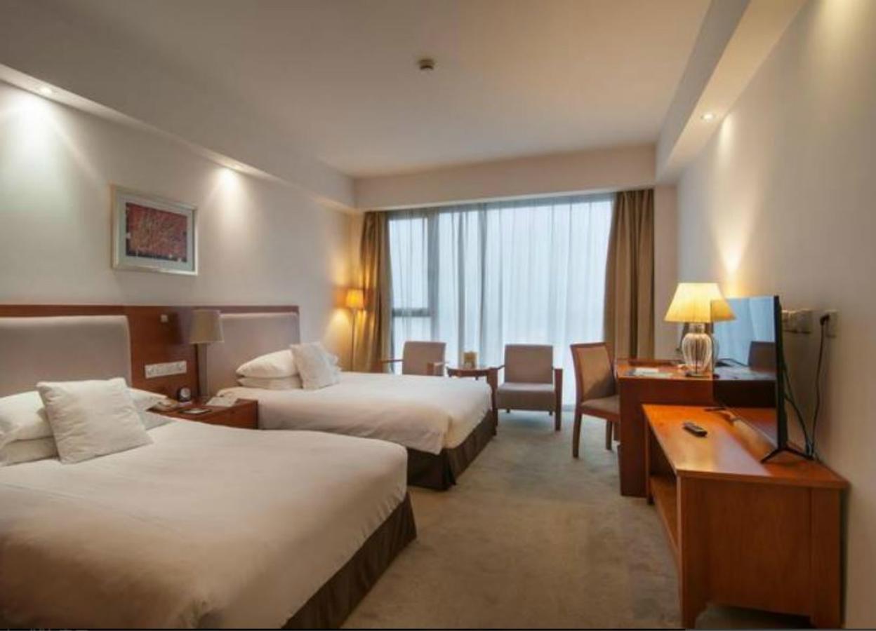 Gloria Plaza Hotel Kangqiao Shanghai Exterior photo